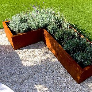 Cortenstaal L-vormige plantenbak Kansas 50, 150x100x30 cm met bodemplaat