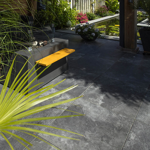 <h1><strong>GeoCeramica Marmostone</strong></h1><p>Marmer is immens populair en gewild als bouwmateriaal dankzij de luxe uitstraling en de bijzondere lichtval die zo eigen is aan het materiaal. Origineel marmer is onbetaalbaar geworden. Dankzij Marmostone kun je genieten van hetzelfde design voor een betere prijs en zonder het intensieve onderhoud van marmer.</p><h2><strong>Ervaar luxe en raffinement met Keramische Tegels met Marmerlook voor jouw buitenoase</strong></h2><p>Betover je buitenruimte met de tijdloze allure van keramische tegels met marmerlook. Ontdek de perfecte combinatie van weelderige esthetiek en duurzaamheid, waarmee je een tuin en terras creëert die een symfonie van elegantie en comfort vormt.</p><p><strong>1. Verfijnde Esthetiek:</strong> Geef je buitenruimte een vleugje luxe met onze keramische tegels die de verfijnde uitstraling van echt marmer nabootsen. Elke tegel is doordrenkt met de prachtige aders en subtiele kleurschakeringen die kenmerkend zijn voor natuurlijk marmer, waardoor een tijdloos en elegant ontwerp ontstaat.</p><p><strong>2. Duurzaamheid in Stijl:</strong> Geniet van de pracht van marmer zonder concessies te doen aan duurzaamheid. Onze keramische tegels zijn bestand tegen de tand des tijds, slijtage en weersinvloeden. Met minimale inspanningen behoud je de schitterende uitstraling van marmer en creëer je een buitenruimte die langdurig indruk maakt.</p><p><strong>3. Veelzijdige Toepassing:</strong> Laat je creativiteit de vrije loop met de veelzijdigheid van keramische tegels met marmerlook. Creëer verbluffende terrassen, sfeervolle looppaden of zelfs elegante accenten rondom je zwembad. De marmerlook past moeiteloos bij diverse ontwerpstijlen, waardoor je de ultieme buitenomgeving kunt vormgeven.</p><p><strong>4. Onderhoudsgemak:</strong> Ontspan en geniet van je buitenruimte zonder je zorgen te maken over intensief onderhoud. Onze keramische tegels met marmerlook vereisen minimaal onderhoud, waardoor je meer tijd hebt om te ontspannen en te genieten van de weelde van je tuin en terras.</p><p><strong>5. Tijdloze Klasse:</strong> Transformeer je buitenruimte in een oase van tijdloze klasse. De marmerlook geeft je tuin en terras een blijvende elegantie die de tand des tijds doorstaat. Geniet van de luxe uitstraling van marmer zonder in te leveren op praktische bruikbaarheid.</p><p>Breng de essentie van luxe naar buiten met onze keramische tegels met marmerlook. Ontdek een wereld van verfijning en tijdloze klasse terwijl je jouw tuin en terras omtovert tot een plek waar stijl en comfort samenkomen.</p><h2><strong>Ontdek de Revolutie in Tuintegels: Geoceramica - Waar Functionaliteit Samenkomt met Esthetiek</strong></h2><p>Bij Sierbestrating Jonk introduceren we met trots Geoceramica, een innovatieve revolutie in tuintegels die de perfecte balans vindt tussen functionaliteit en esthetiek. Deze geavanceerde keramische tegels zijn ontworpen om aan al je verwachtingen te voldoen en je buitenruimte te transformeren tot een oase van schoonheid en duurzaamheid.</p><p><em>Waarom kiezen voor Geoceramica?</em></p><p><strong>1.</strong> <strong>Dual Power:</strong> Geoceramica combineert de voordelen van keramiek en beton in één unieke tegel. Het keramische oppervlak biedt een luxe uitstraling en is tegelijkertijd bestand tegen krassen, vlekken en verkleuring. Het betonnen draagsysteem zorgt voor de benodigde stabiliteit en duurzaamheid.</p><p><strong>2. Extreme Weerbestendigheid:</strong> Dankzij de geavanceerde productietechnieken zijn Geoceramica tegels bestand tegen extreme weersomstandigheden. Vorst, hitte of regen, deze tegels blijven hun schoonheid behouden, jaar na jaar.</p><p><strong>3. Eenvoudige Installatie:</strong> Het unieke ontwerp van Geoceramica maakt snelle en eenvoudige installatie mogelijk. Of je nu een ervaren klusser bent of professionele hulp zoekt, de tegels zijn ontworpen voor een efficiënte plaatsing.</p><p><strong>4. Milieuvriendelijk:</strong> Geoceramica is gemaakt met oog voor het milieu. Het gebruik van duurzame materialen en de lange levensduur van de tegels dragen bij aan een groenere leefomgeving.</p><p><strong>5. Ruime Designkeuze:</strong> Of je nu houdt van strakke lijnen, rustieke texturen of moderne patronen, Geoceramica biedt een breed scala aan designs en kleuren. Personaliseer je buitenruimte naar jouw smaak en creëer een unieke ambiance.</p><p>Upgrade je terras, tuinpad of binnenplaats met de veelzijdige en duurzame Geoceramica tegels van Sierbestrating Jonk. Ontdek de perfecte combinatie van stijl en kracht voor een buitenruimte die de tand des tijds doorstaat.</p><p>Neem contact met ons op voor meer informatie of om onze collectie Geoceramica tegels te bekijken. Maak van je buitenruimte een meesterwerk met Geoceramica!</p>