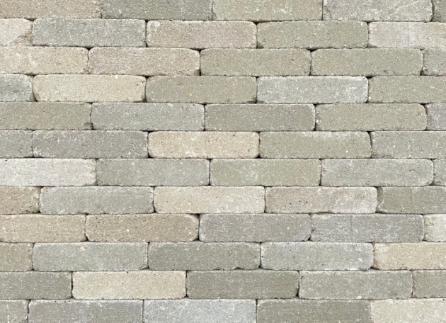 Restpartij Schagen: 4,3m2 Stonique trommel waalformaat 7 cm oud heeg