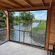 Glazen Schuifwand 277(B)x224(H) cm tbv voorzijde Buitenverblijf 600x300/370 cm met berging 300 cm