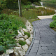 Restpartij Zwanenburg: ca. 9m2 Stonique Trommel 20x30x5 cm Antraciet